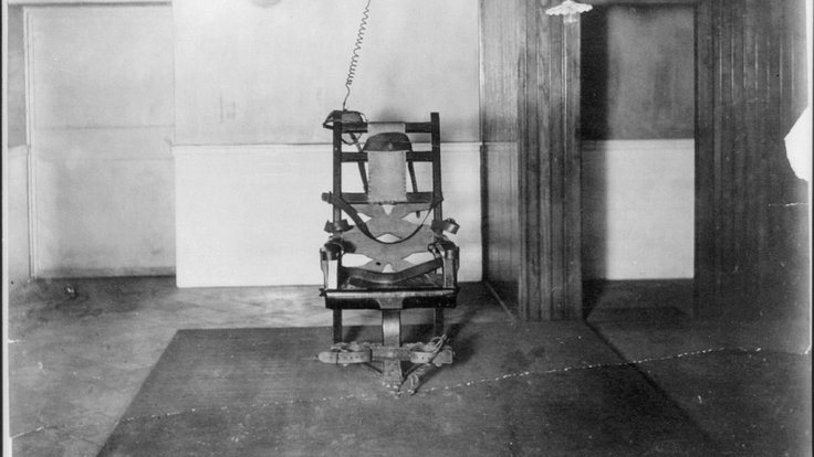 1280px-The_electric_chair_in_Auburn_State_Prison_LCCN2012646356