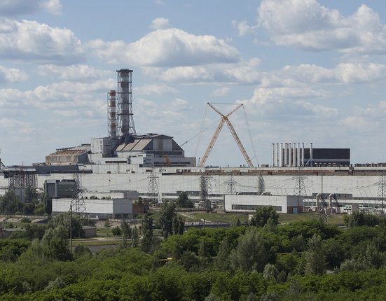 Chernobyl_NPP_Site_Panorama_with_NSC_Construction_-_June_2013