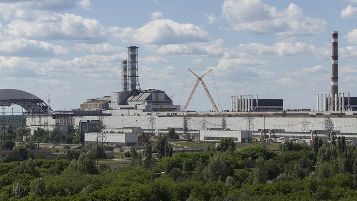 Chernobyl_NPP_Site_Panorama_with_NSC_Construction_-_June_2013