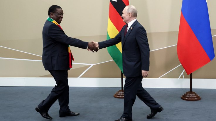 Mnangagwa_and_Putin_met_during_sidelines_Russia-Africa_Summit,_27_July_2023