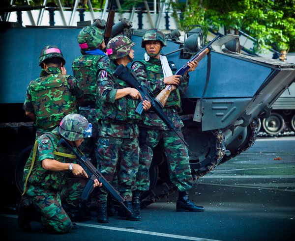 Thai_soldiers_and_Type_85_APCs_during_2010_Thai_political_protests