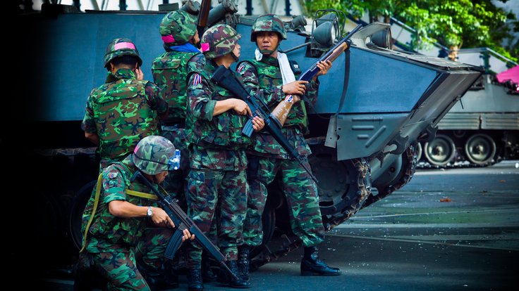 Thai_soldiers_and_Type_85_APCs_during_2010_Thai_political_protests