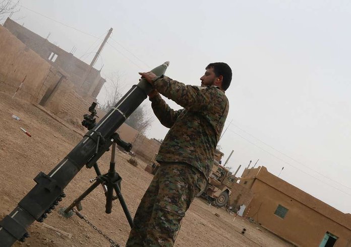 a-syrian-democratic-forces-sdf-member-readies-a-120mm-a8c429-1024