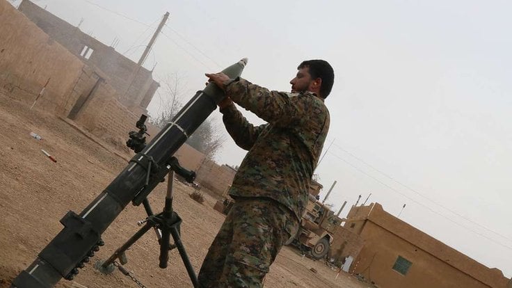 a-syrian-democratic-forces-sdf-member-readies-a-120mm-a8c429-1024