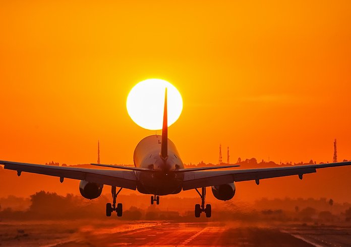 aircraft-landing-sunset