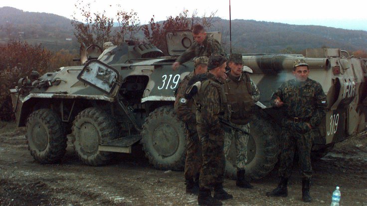 armed-russian-army-soldiers-stnad-on-and-next-to-their-ifor-marked-btr-80-armored-cd5663-1024