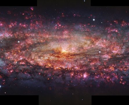 Pohled na galaxii Sochař pomocí MUSE