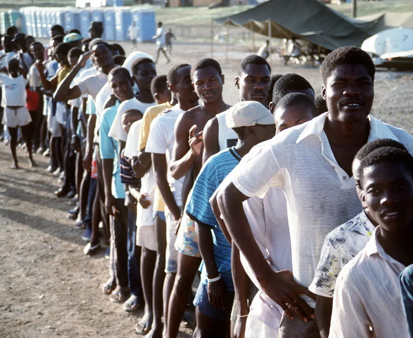 haitian-refugees-stand-in-line-at-camp-mccalla-site-of-a-humanitarian-relief-eb068c-1024