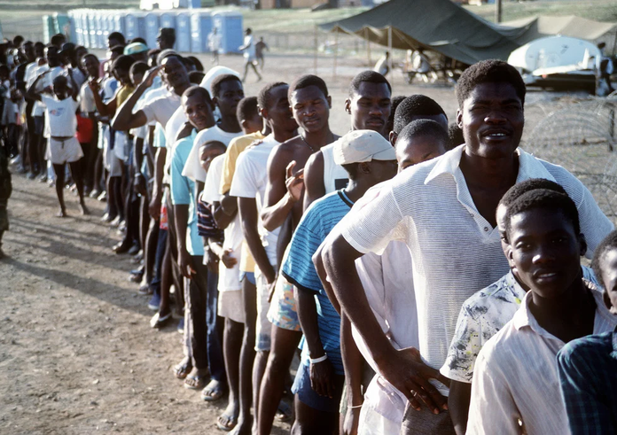 haitian-refugees-stand-in-line-at-camp-mccalla-site-of-a-humanitarian-relief-eb068c-1024