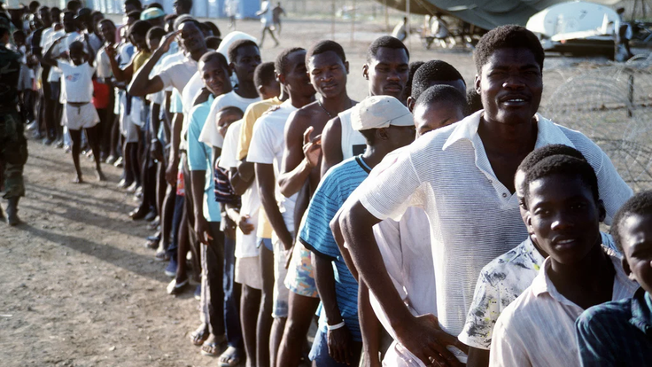 haitian-refugees-stand-in-line-at-camp-mccalla-site-of-a-humanitarian-relief-eb068c-1024