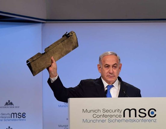 netanyahu-holds-a-piece-of-an-armed-iranian-drone-shot-down-over-israel-ec6bd8-1024