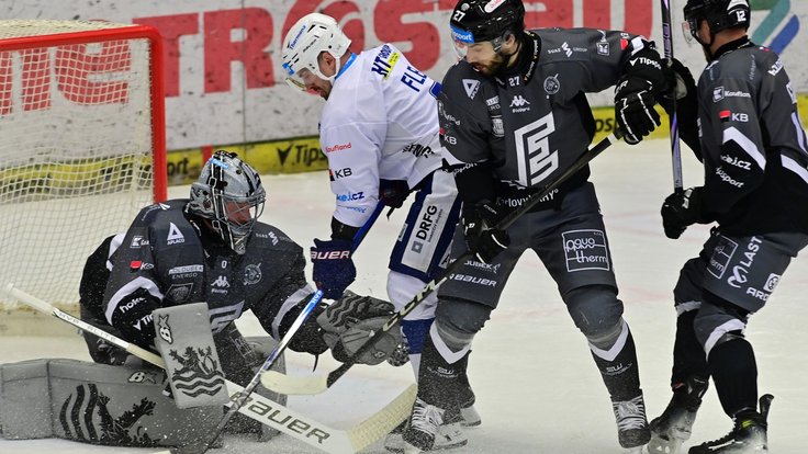 Jakub Flek před Dominikem Frodlem.