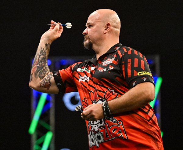 Karel Sedláček při úvodním utkání na Grand Slamu.