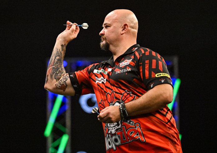 Karel Sedláček při úvodním utkání na Grand Slamu.