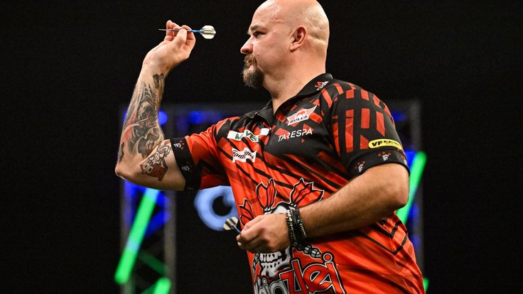 Karel Sedláček při úvodním utkání na Grand Slamu.