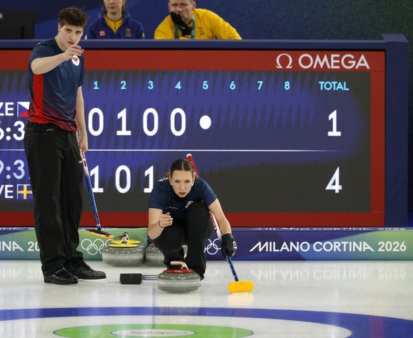 Vít Chabačovský s Julií Zelingrovou na olympijském turnaji